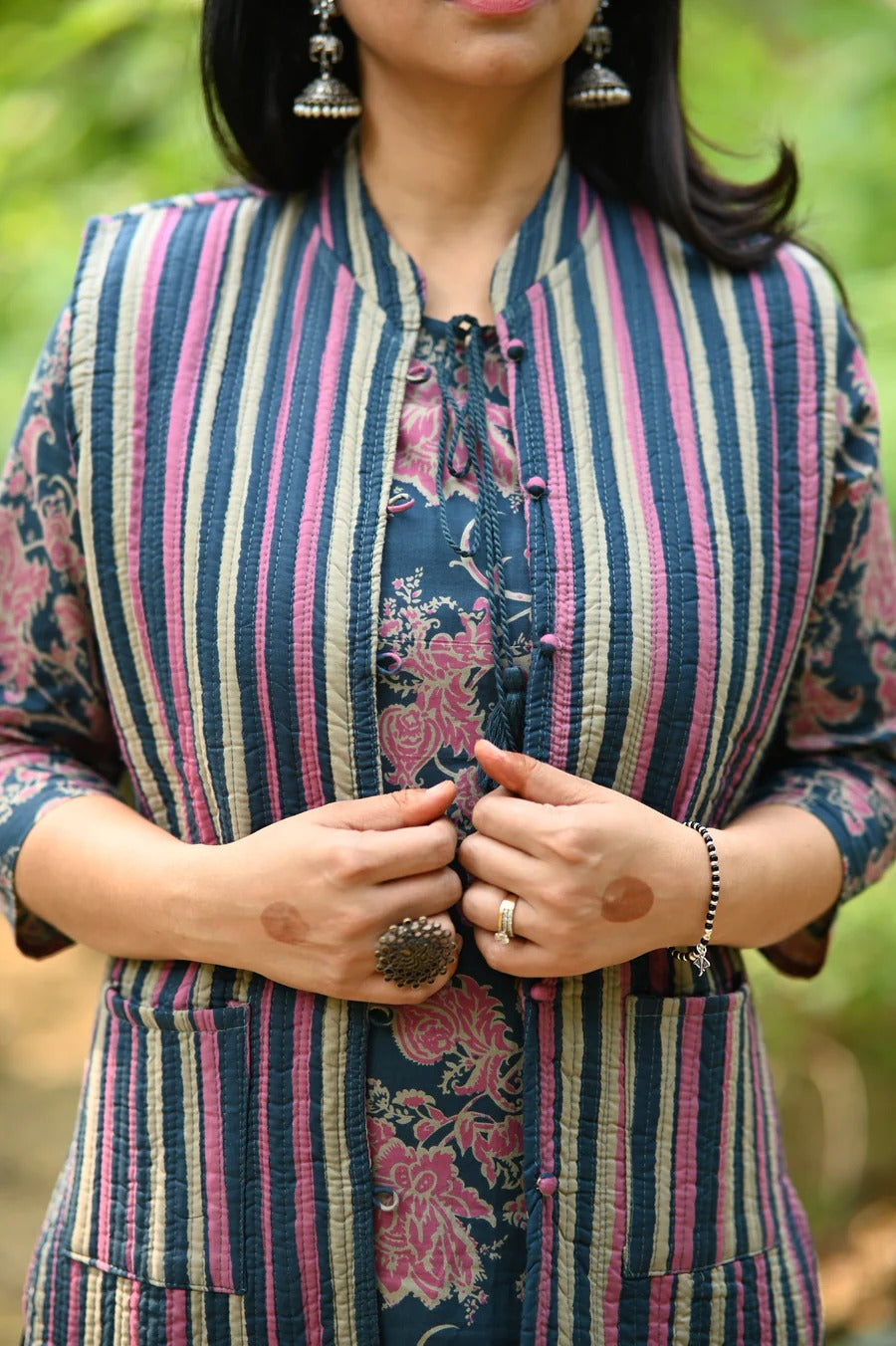 Elevate your ethnic style with this elegant heavy suit set, adorned with intricate hand embroidery and mill prints.