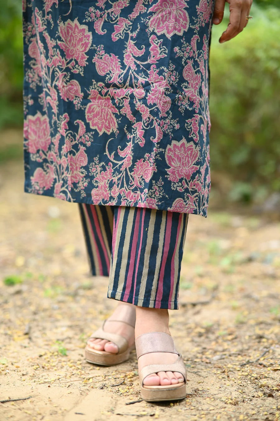 Elevate your ethnic style with this elegant heavy suit set, adorned with intricate hand embroidery and mill prints.