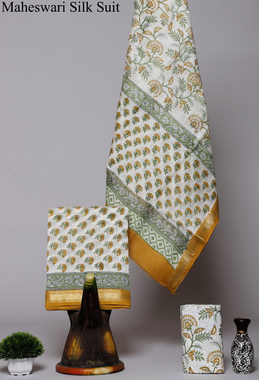 Ethereal Grace: White and Green Floral Maheshwari Silk Suit