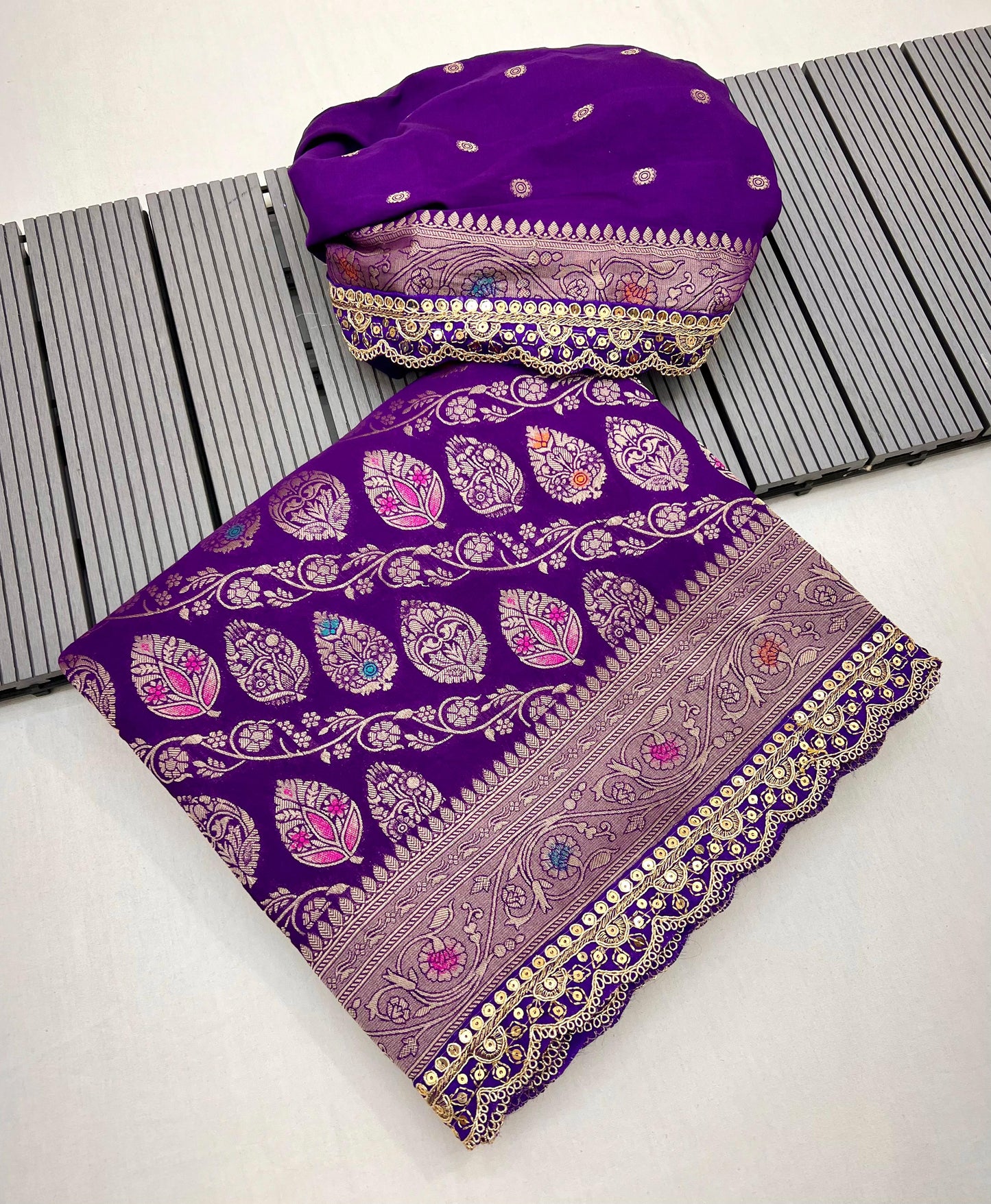Adorn yourself in this beautiful and charming pure khaddi georgette designer saree in sabyasachi scallop intricate borders