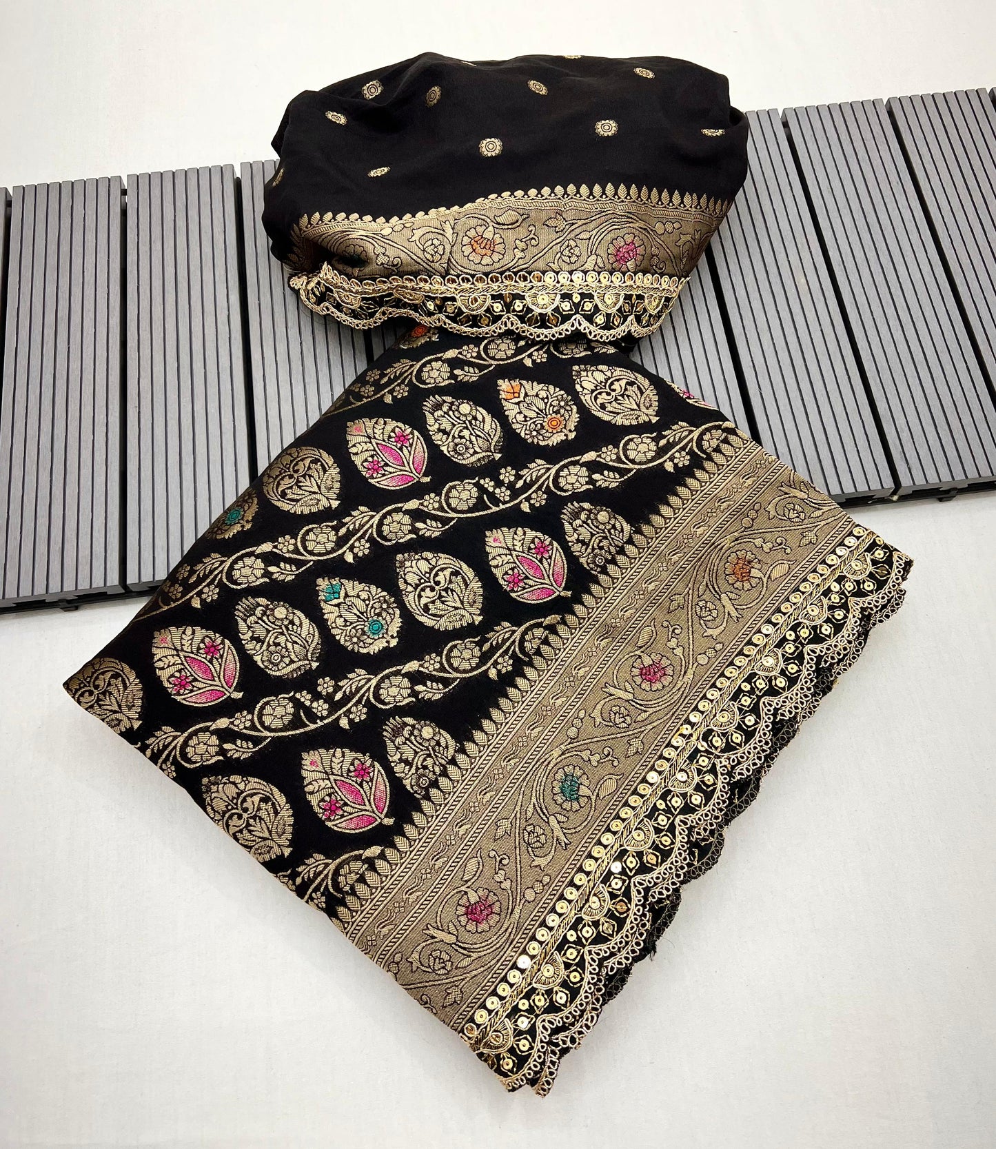 Adorn yourself in this beautiful and charming pure khaddi georgette designer saree in sabyasachi scallop intricate borders