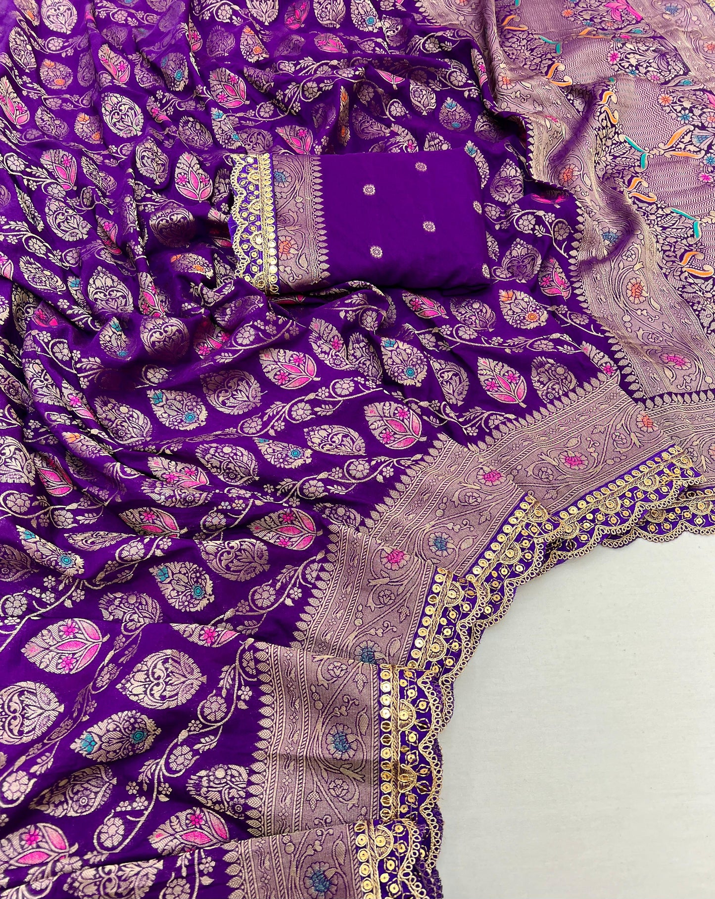 Adorn yourself in this beautiful and charming pure khaddi georgette designer saree in sabyasachi scallop intricate borders